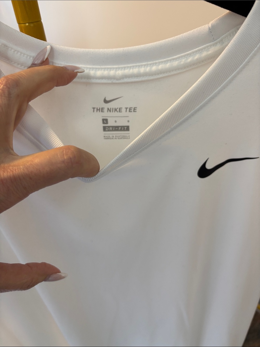 Nike White Tee with Black Swoosh Logo